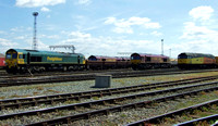Freightliner 66551 with EWS 66136 and Colas Railfreight 47727